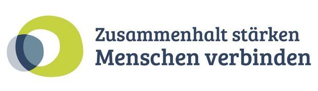 Logo mit dem Text „Zusammenhalt stärken, Menschen verbinden“ in blauen und grünen Farben.